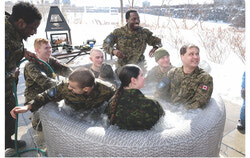 Both teams from the Hull Regiment take a nice hot bath after a rather chilly first one. Photo: Christian Rochefort