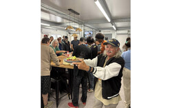 Residents enjoyed a meal featuring Haitian flavours last Sunday. Photo: Transitiôn